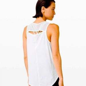 Comfy and stretchy white lululemon tank top. Never worn